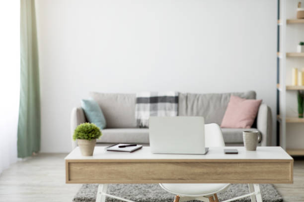 istock Remote workplace in interior of modern apartment in minimalist design 1316590738