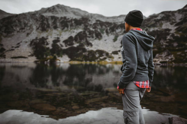 istock Exploring lake in the mountains  at overcast weather 1316591024