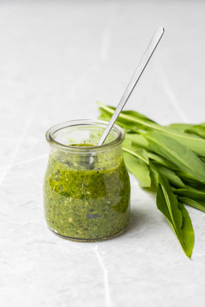 istock Wild garlic pesto in a glass 1316593633