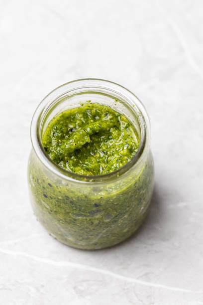 istock Wild garlic pesto in a glass 1316593635