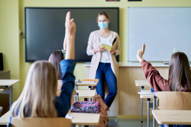 istock Rear view of active school children during the lesson 1316594972