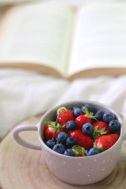 istock Bowl of Fruit and Book 1316597789