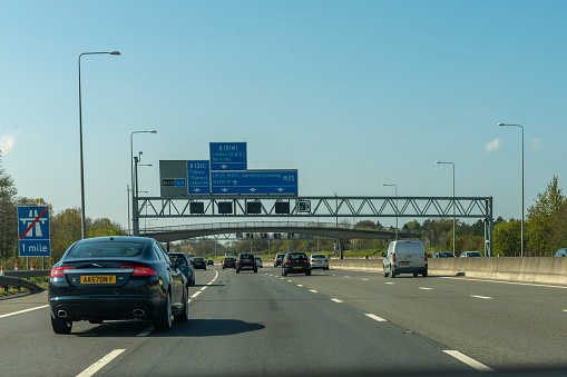 The motorway approach to the toll road over the Thames at the Dartford Crossing.  This was taken as a passenger approaching the suspension bridge Dartford, London, England, UK.