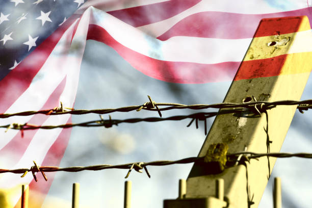 istock Barbed wire and flag of USA 1316607920