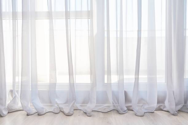 istock Window curtains, wood floor, interior, background. Abstract image, copy space 1316611992