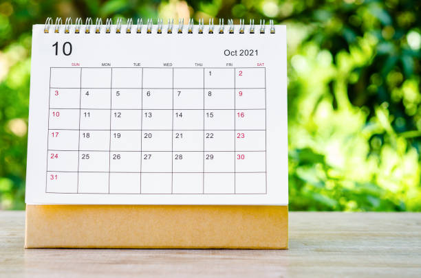 istock October 2021 Calendar desk for organizer to plan and reminder on wooden table 1316612082