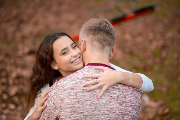 istock Romantic couple are the park autumn 1316612185