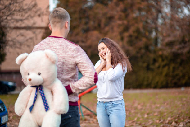 istock Boyfriend gives her girlfriend present 1316612271