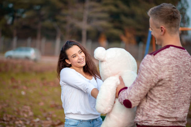 istock Boyfriend gives her girlfriend present 1316612291