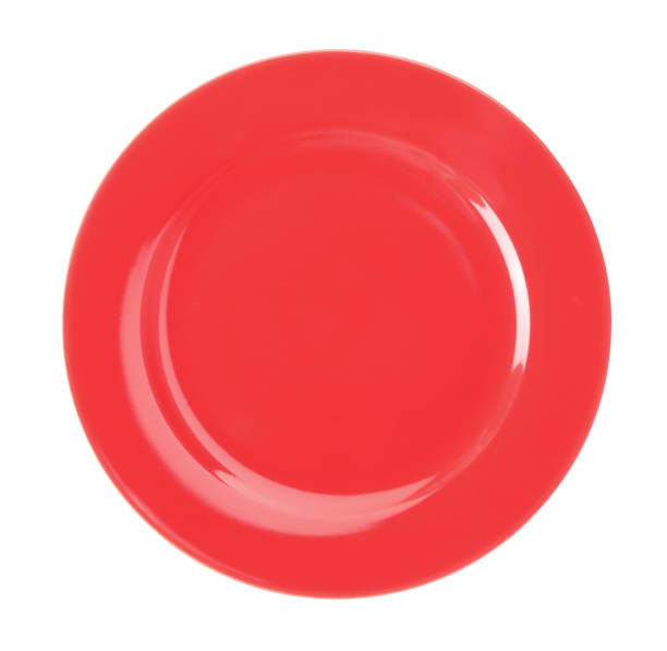istock New clean red plate isolated on white, top view 1316612612
