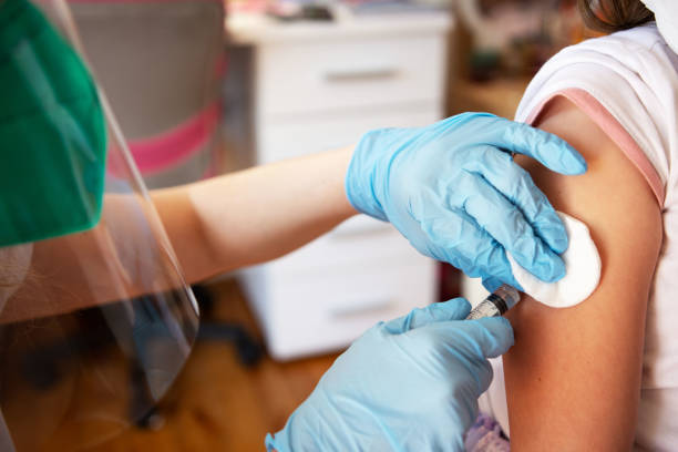 istock Girl getting a vaccine. 1316616809