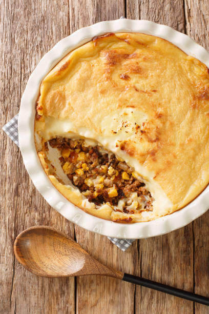 istock Pate Chinois Quebec Style Shepherd’s Pie closeup in the baking dish. Vertical top view 1316617594