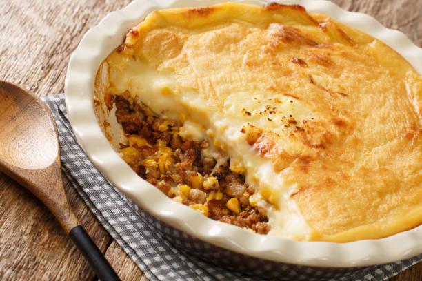 istock Canadian Pate Chinois pie with ground beef, corn and mashed potatoes close-up in a baking dish. Horizontal 1316617707