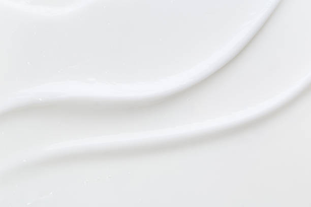 istock White lotion swatch isolated on white. Cosmetic liquid cream tex 1316619232