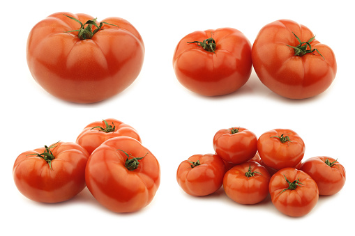 Fresh beef tomatoes on a white background