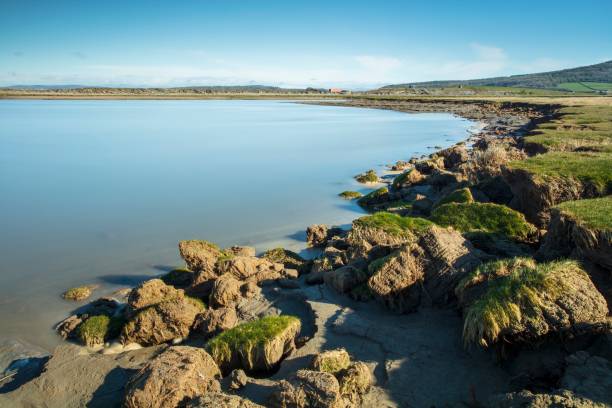 erosão costeira da baía de morecambe - lancaster lancashire - fotografias e filmes do acervo