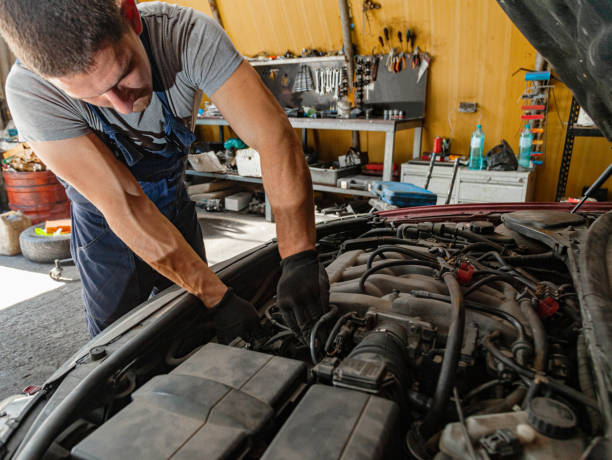 istock Car Engine Repair Technician Mechanic Shop Worker 1316622100