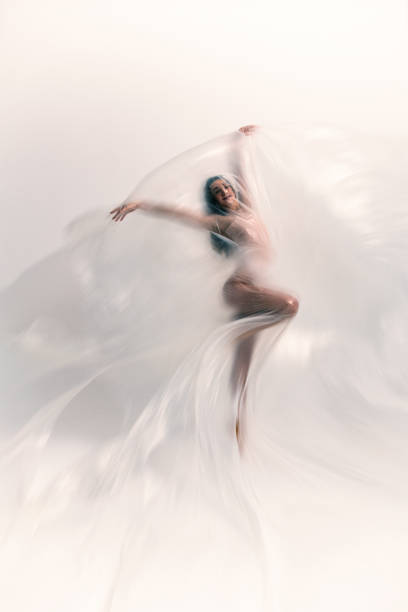 istock Beautiful ballerina is dancing with thin nylon 1316623127