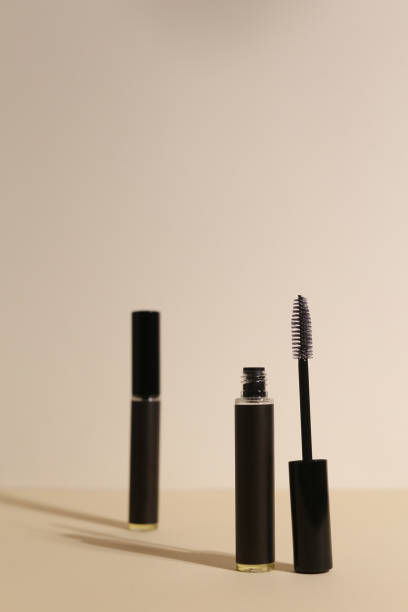 isolated mascara on neutral backfround. open with brush, black - backfround imagens e fotografias de stock