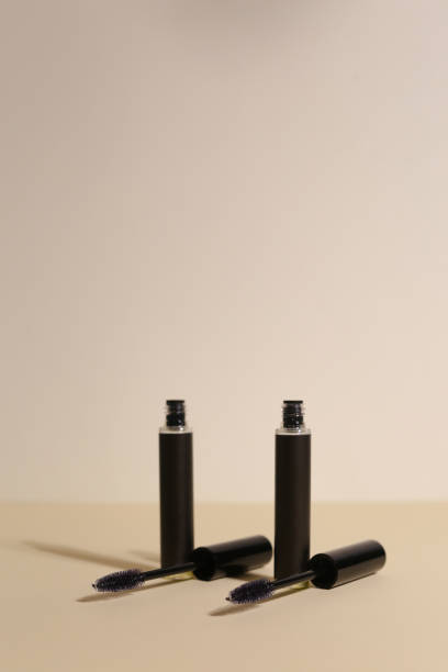istock Isolated mascara on neutral backfround. Open with brush, black. Focus on brush 1316624653