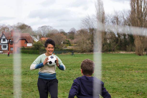 istock Playing Catch With a Football 1316625041