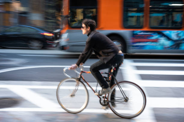 istock Cyclist in city traffic - action 1316625320