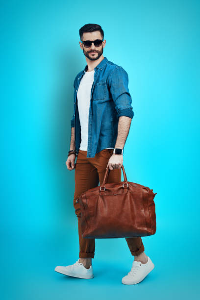 istock Full length of trendy young man 1316626542