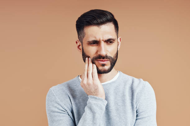 istock Frustrated young man in smart casual wear 1316627230