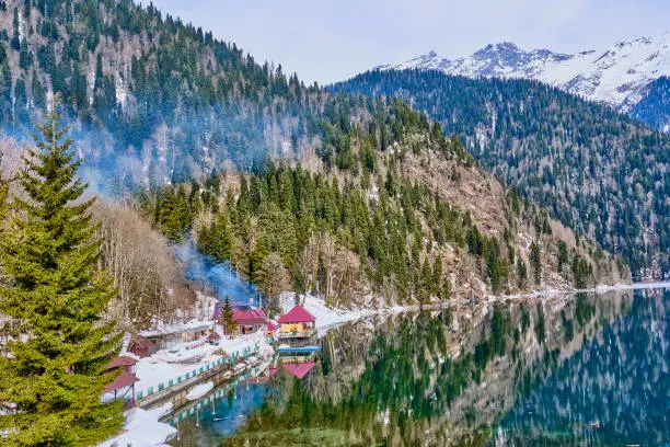 Photo of Lake Ritsa in the spring season. Located in Abkhazia, in the Caucasus Mountains.