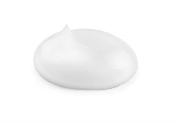 istock Beautiful drop of cream on a white background. 1316628279