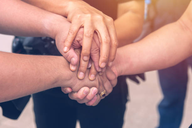 istock Together collaborate of hands teamwork outdoor 1316634995