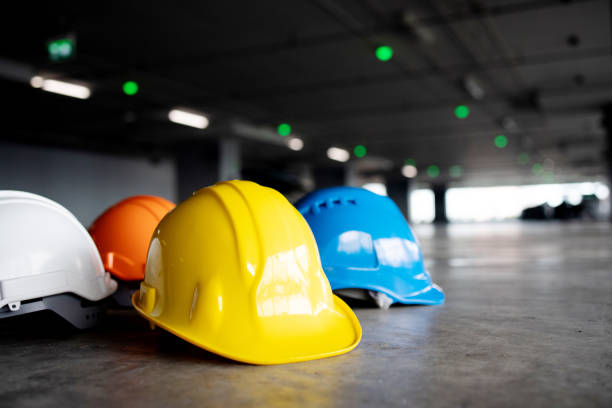istock Helmet group for safety working in construction plants. Hard hat For safe at work. Teamwork of construction team must have quality. Whether it is engineering, construction workers. 1316636320