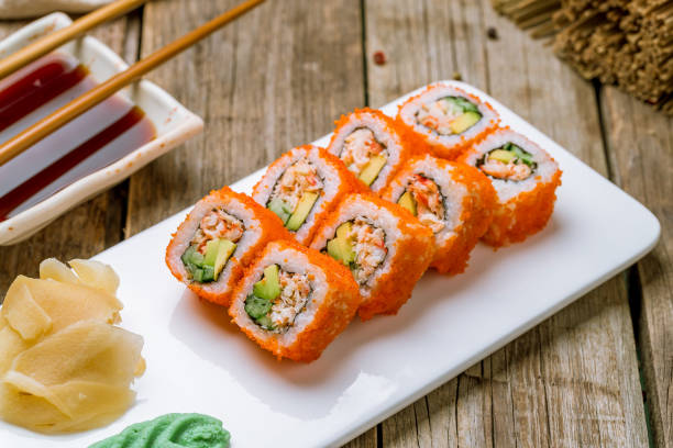 istock California roll with crab on white plate on old wooden table 1316636441