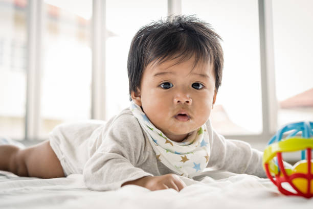 istock Asian Baby playing with at home 1316638516