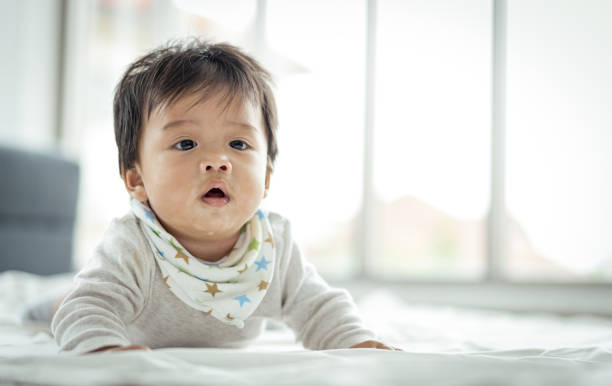 istock Asian Baby playing with at home 1316638620