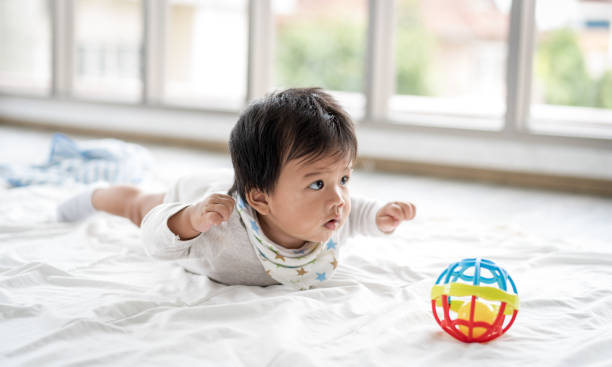 istock Asian Baby playing with at home 1316638680