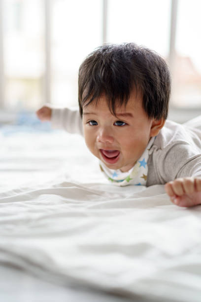 istock Asian Baby playing with at home 1316638723