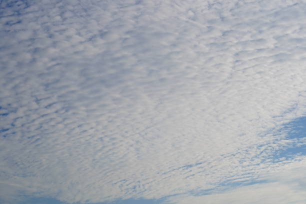 istock White clouds and sun in blue sky background in nature 1316640370