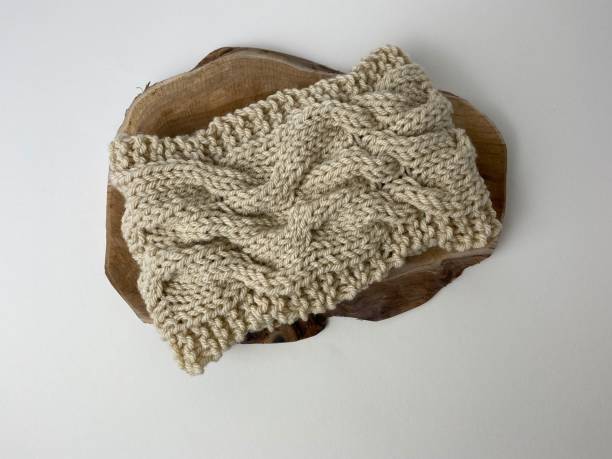 istock Hand knit headband with cable stitch detail 1316641297
