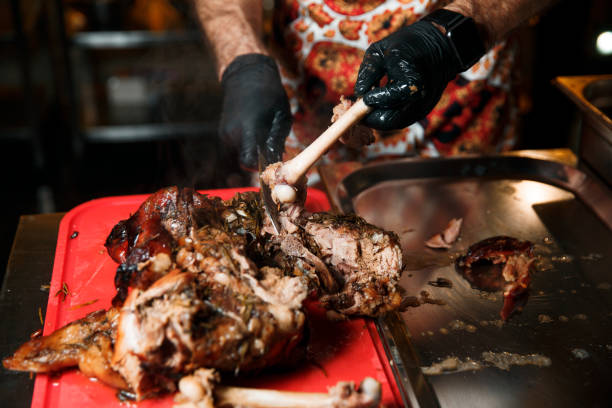 istock The cook cuts the cooked meat 1316647861