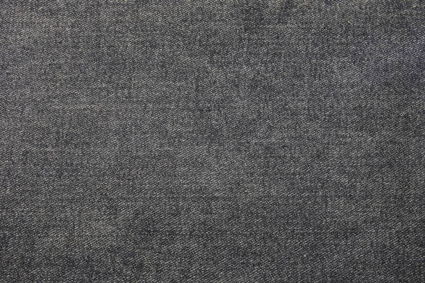 istock Black color jean cloth texture background. 1316648894