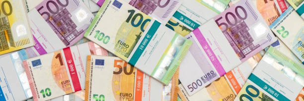 istock bundles of many Euro banknotes 1316654488