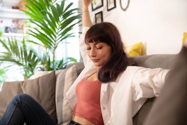 istock Young Woman Relaxing at Home 1316657122
