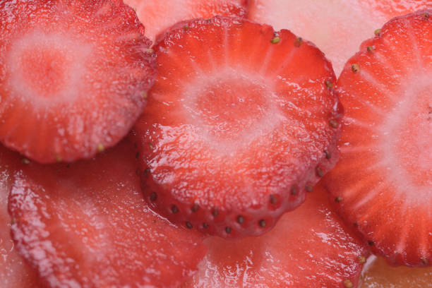 istock Sliced strawberry slices close up 1316657904