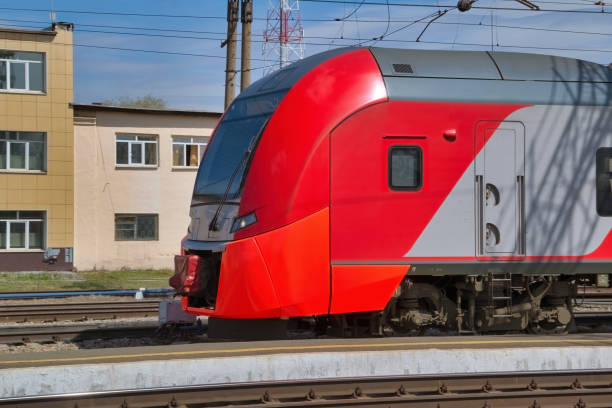istock High-speed passenger electric train on the platform close-up. 1316661923