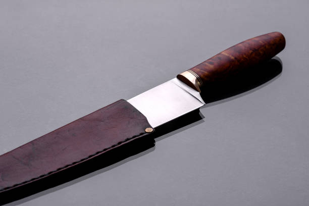 istock A large handmade hunting knife lying on a dark background 1316662829