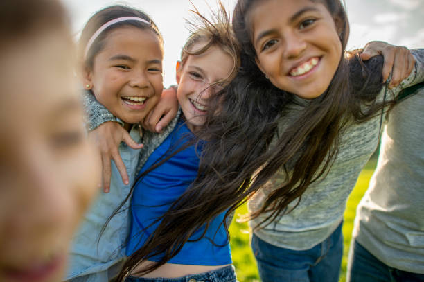 istock Children laughing outside 1316665506