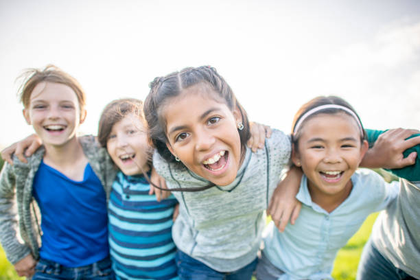 istock Children laughing outside 1316665517