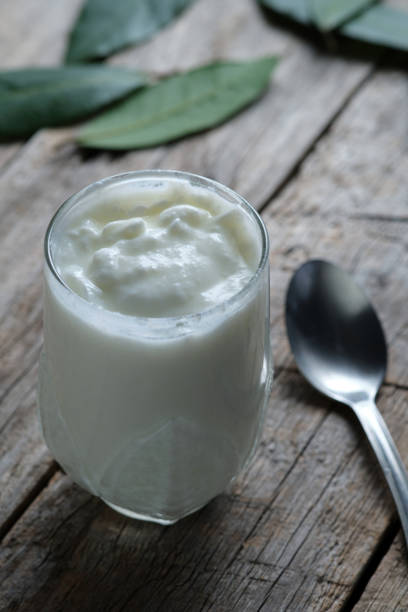 istock Natural yogurt in a glass cup 1316665575