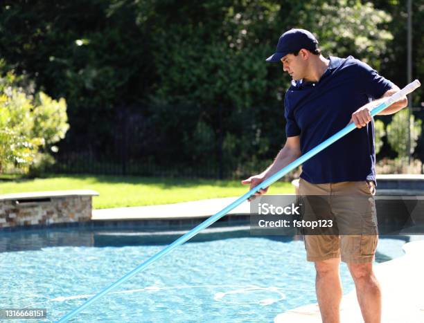 Repairman Cleaning Service Man At Home Swimming Pool Stock Photo - Download Image Now